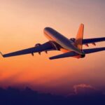 Millennial Magazine - sunset flight travel