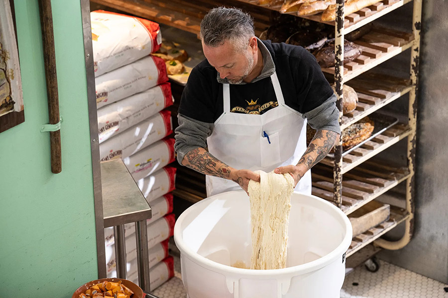 Millennial Magazine - Founders - chef tony making bread