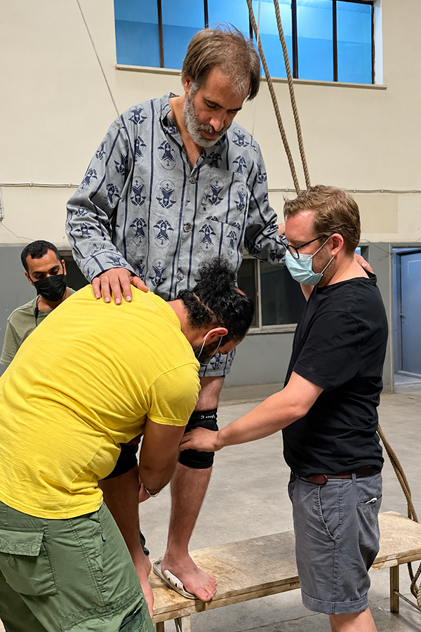 Sol Bondy with lead actor Mehdi Bajestani and stunt crew on the set of Holy Spider in Jordan