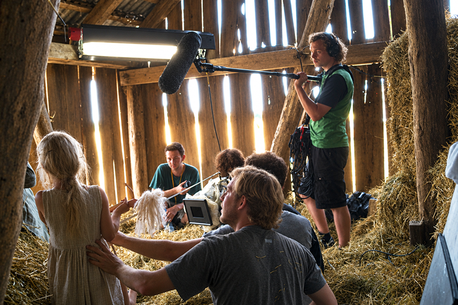 Sol Bondy pictured in front with the crew on the set of My Father Is Sleeping
